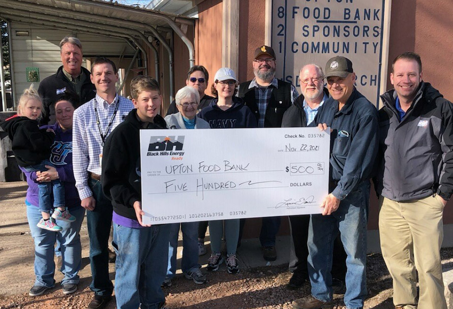 Donation check presented to the upton food bank
